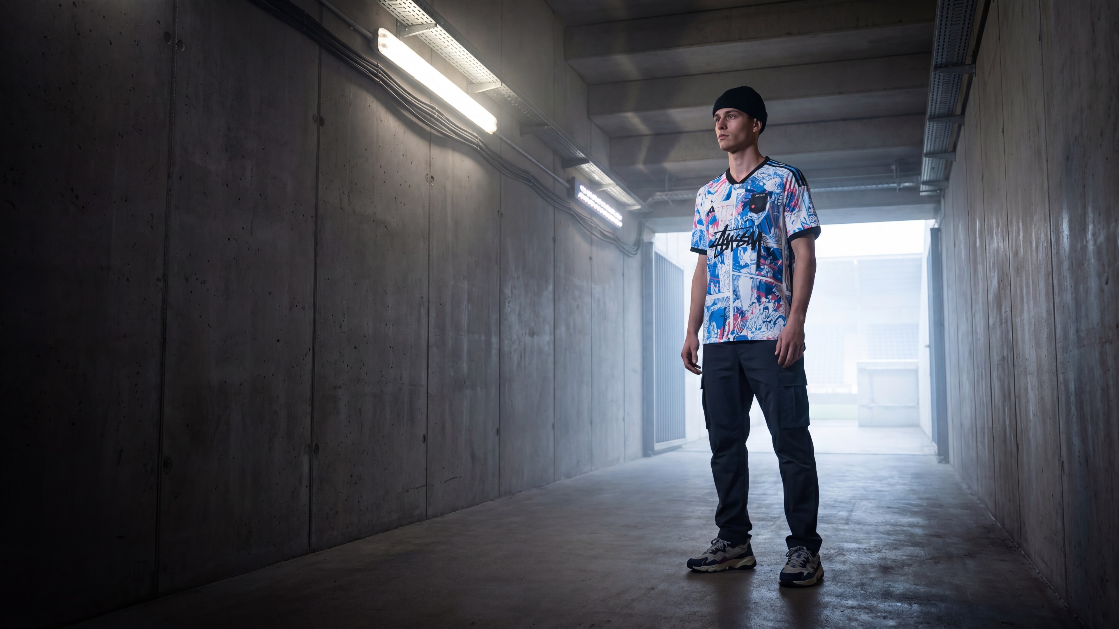 Touchline Drip fantasy football jersey styled in a stadium tunnel