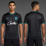 Model wearing Corteiz x Brazil Shadow and Teal Limited Jersey, a Touchline Drip football x streetwear jersey