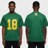 Model wearing Corteiz HMP Mesh Panel Jersey Green, a Touchline Drip football x streetwear jersey