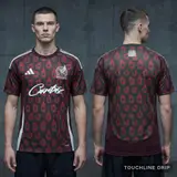 Model wearing Mexico x CRTZ 2024 Home Jersey, a Touchline Drip football x streetwear jersey
