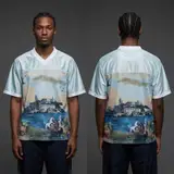 Model wearing Corteiz Narnia Football Jersey Blue/cream, a Touchline Drip football x streetwear jersey