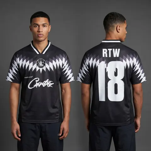 Model wearing Corteiz Club RTW Football Jersey Black, a Touchline Drip football x streetwear jersey
