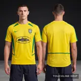 Model wearing Corteiz x Brazil Yellow 2002 Inspired Special Edition Jersey, a Touchline Drip football x streetwear jersey