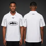 Model wearing Corteiz White Talismo Jersey, a Touchline Drip football x streetwear jersey