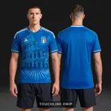 Model wearing Italy Deep Blue Colloseum Jersey, a Touchline Drip football x streetwear jersey