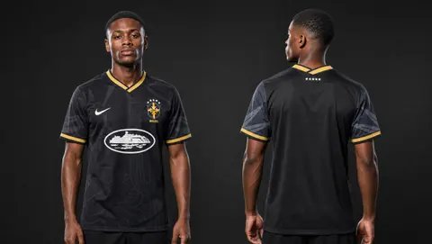 Model wearing Corteiz x Brazil Desert Breeze Alcatarz Concept Jersey, a Touchline Drip football x streetwear jersey
