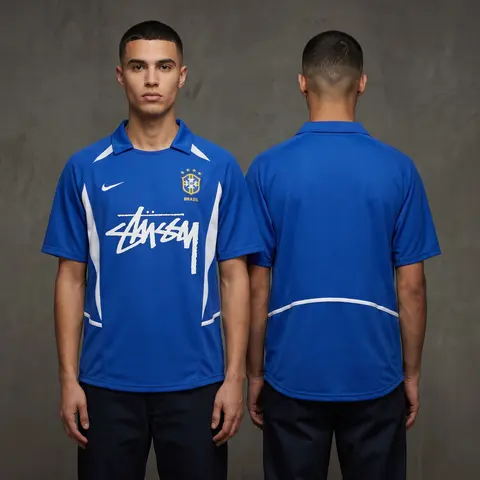 Model wearing Nike x Stussy x Brazil Blue 2002 Inspired Special Edition Jersey, a Touchline Drip football x streetwear jersey