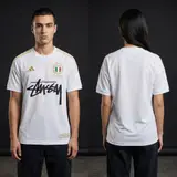 Model wearing Stussy x Italy 125th Anniversary Jersey, a Touchline Drip football x streetwear jersey