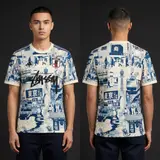 Model wearing Stussy x Japan "tokyo Streetscape" Concept Jersey – Cream/blue, a Touchline Drip football x streetwear jersey
