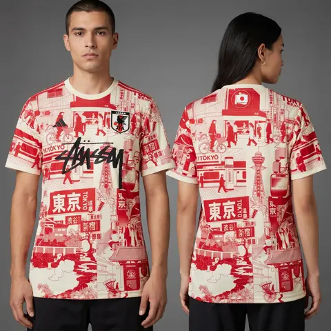 Model wearing Stussy x Japan "tokyo Streetscape" Concept Jersey – Red, a Touchline Drip football x streetwear jersey