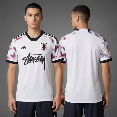 Model wearing Stussy x Japan White Sakura Jersey, a Touchline Drip football x streetwear jersey
