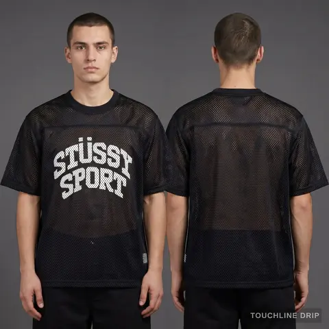 Model wearing Stussy Sport Mesh Jersey - Black, a Touchline Drip football x streetwear jersey
