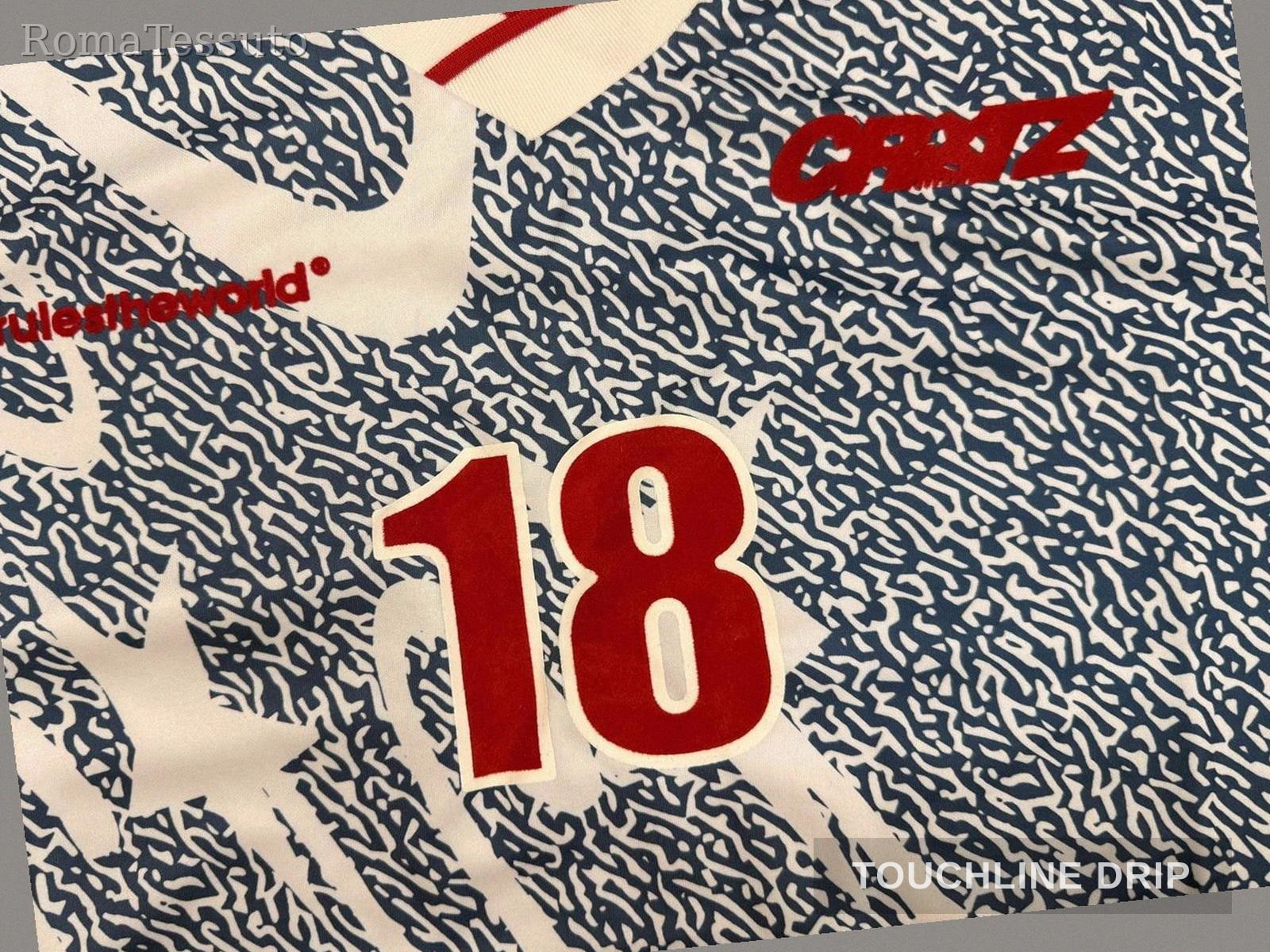 logo closeup product image of Corteiz Grey Stellations Football Jersey
