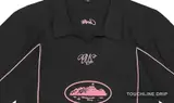 logo closeup detail image of Corteiz Black and Pink Talismo Jersey