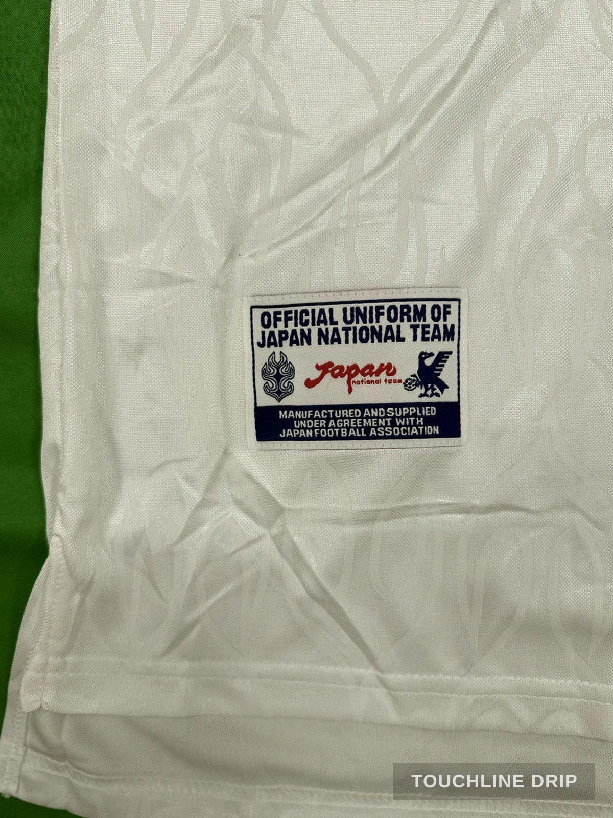 badge closeup product image of Corteiz x Asics Japan 1998 Away Jersey