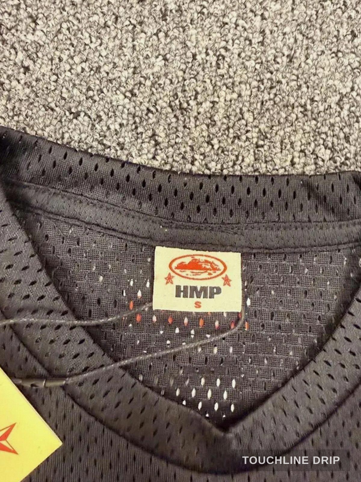 logo closeup product image of Corteiz HMP Mesh Panel Jersey Black