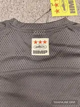patch closeup product image of Corteiz HMP Mesh Panel Jersey Black