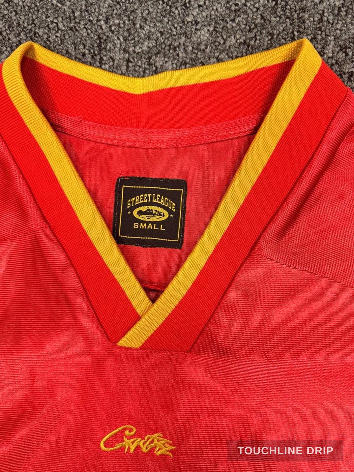 badge closeup product image of Corteiz Da Magpies Red Jersey