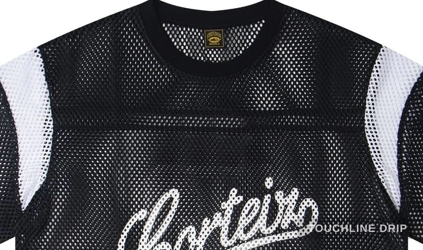 logo closeup detail image of Corteiz Open Mesh Panel Jersey Black/white