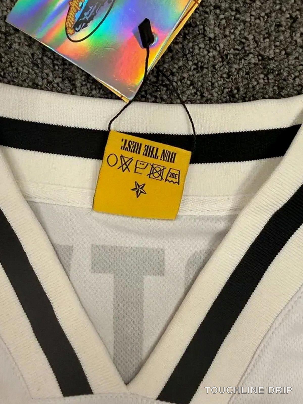 Sleeve and collar detail of Corteiz Club RTW Germany Football Jersey