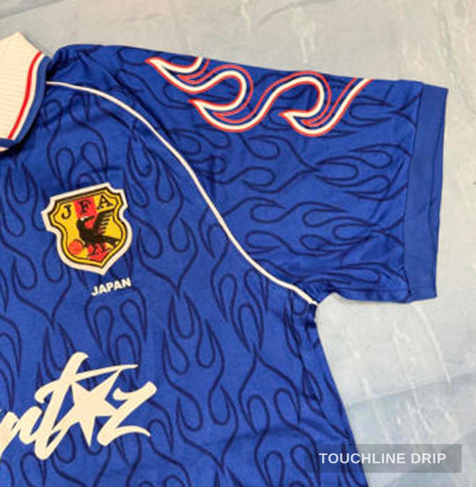 badge closeup product image of Corteiz x Asics Japan 1998 Concept Jersey