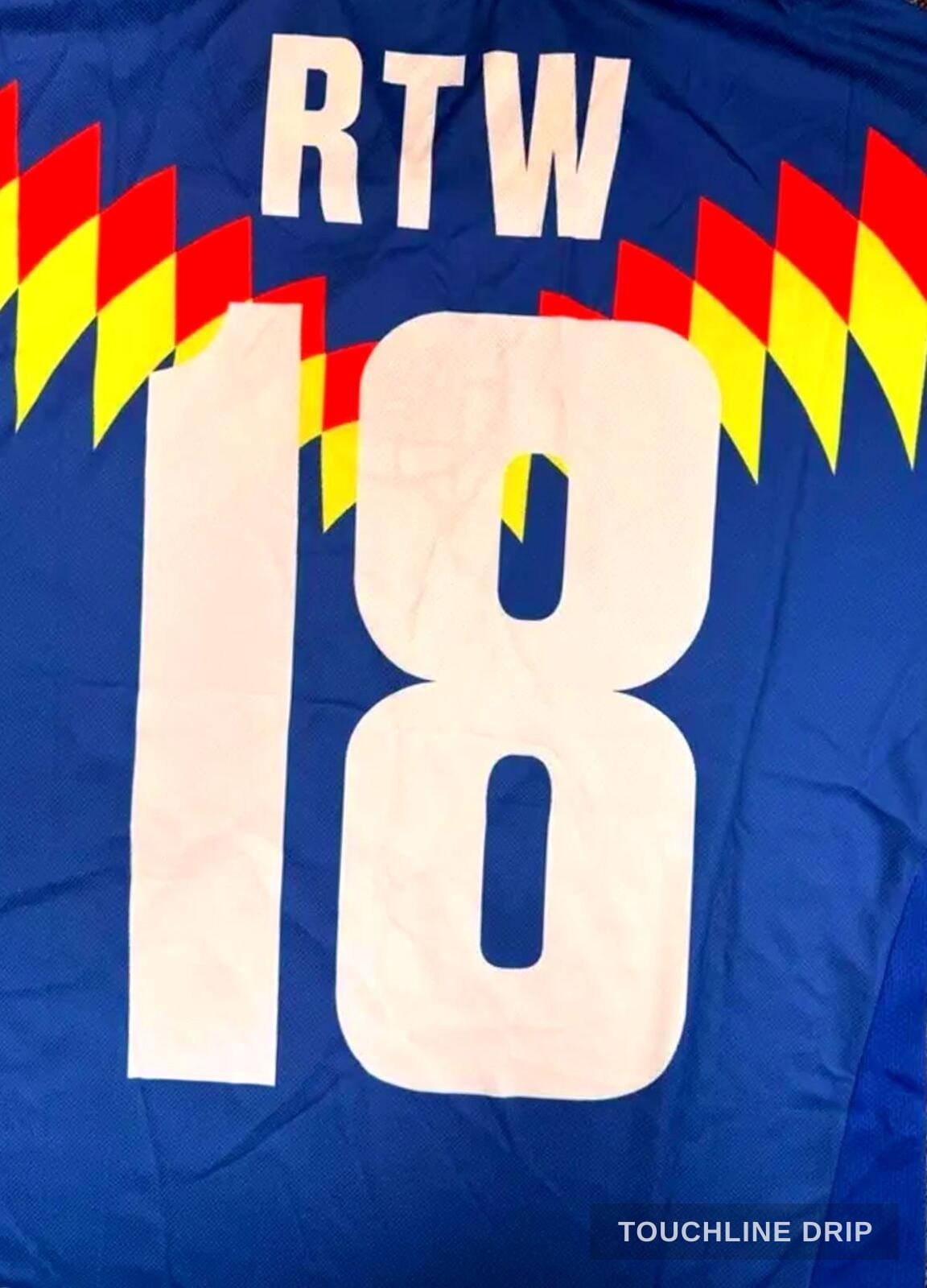 badge closeup product image of Corteiz Club América Blue Jersey