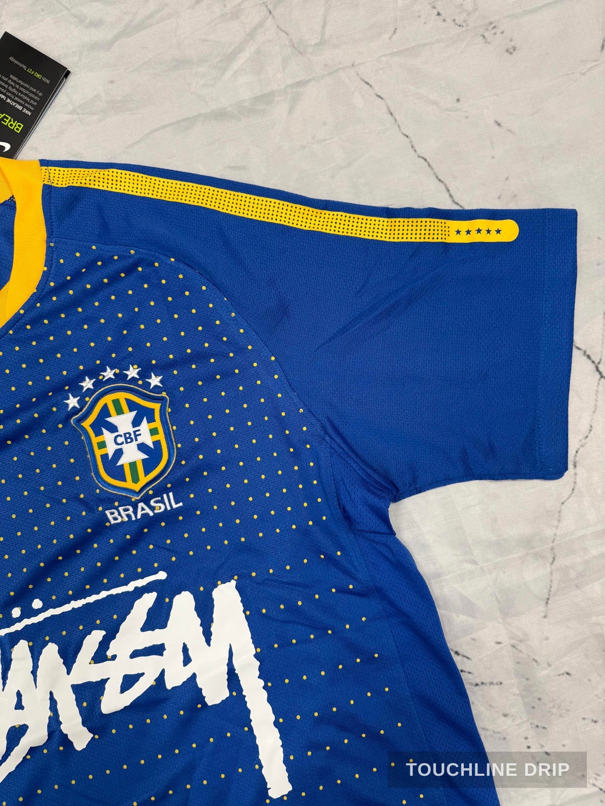 sleeve product image of Nike x Stussy Brazil Dynamic Blue Concept Jersey