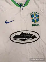 logo closeup product image of Nike x Corteiz Alcatraz Brazil White Leopard Concept Jersey
