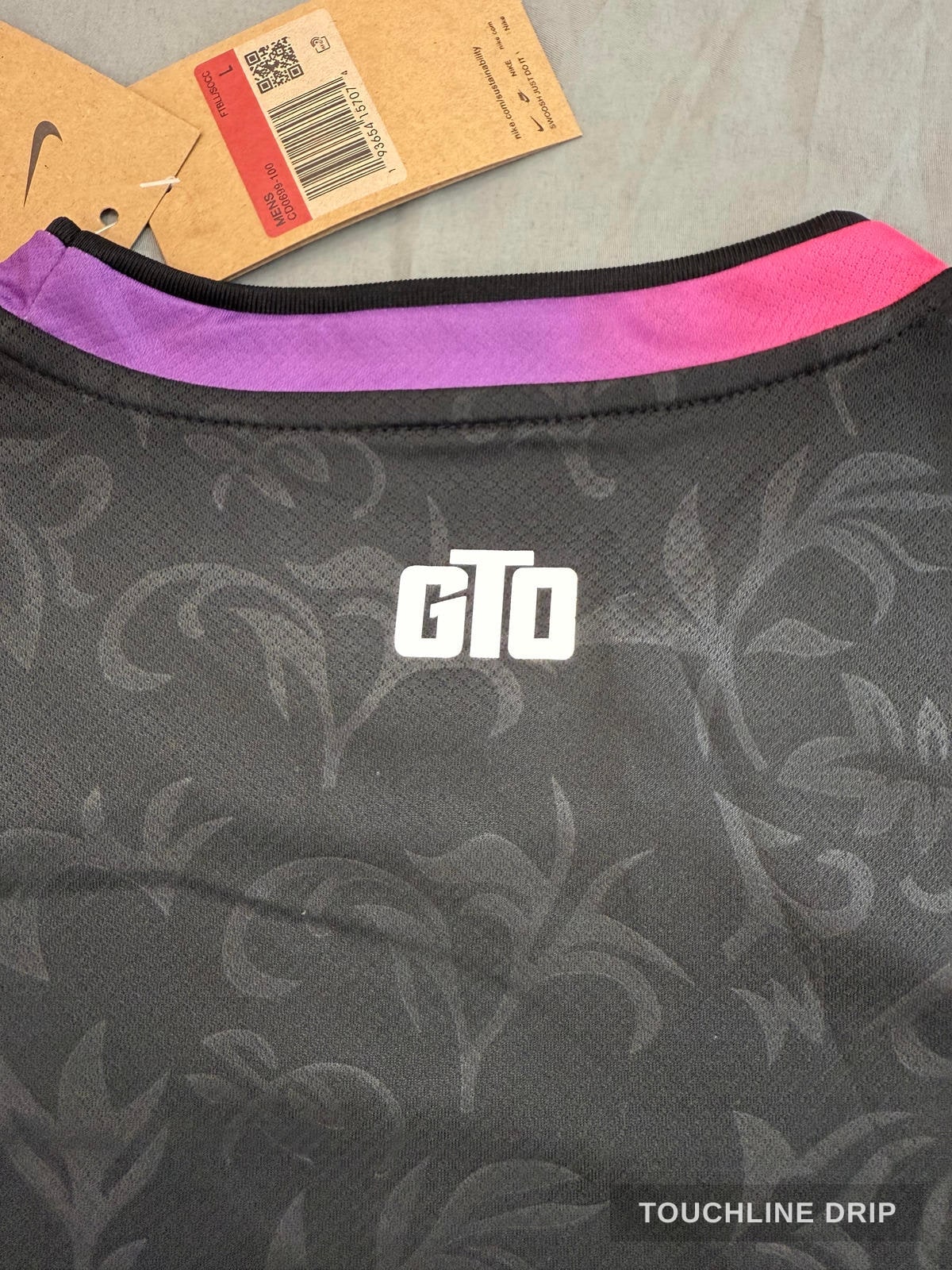patch closeup product image of Nike x Stussy PSG GTO Black and Pink Jersey
