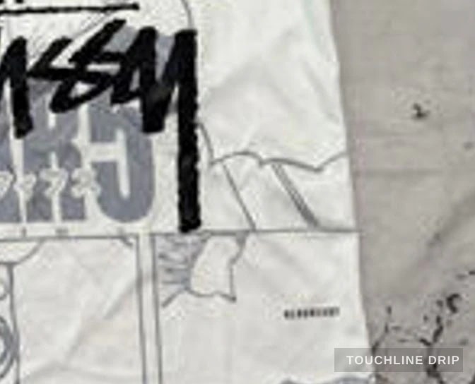 patch closeup detail image of Stussy x Japan One Piece White Jersey