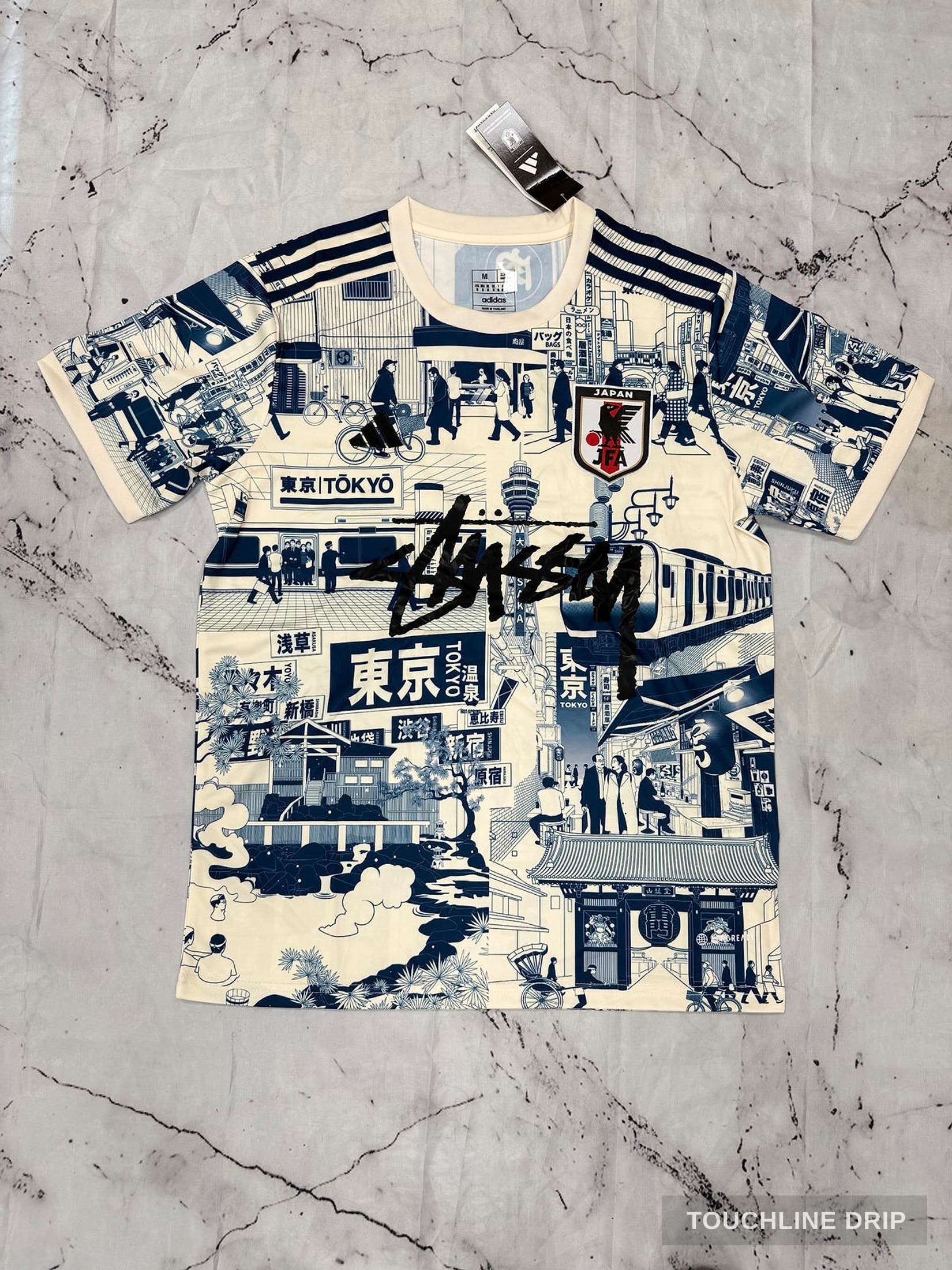 Front product image of Stussy x Japan "tokyo Streetscape" Concept Jersey – Cream/blue