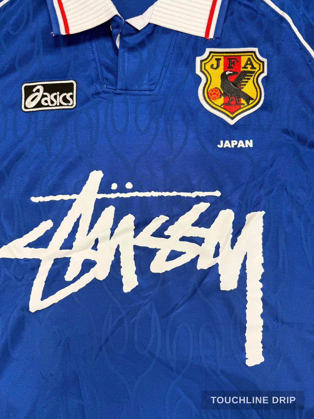 logo closeup product image of Stussy x Asics Japan 1998 Concept Jersey