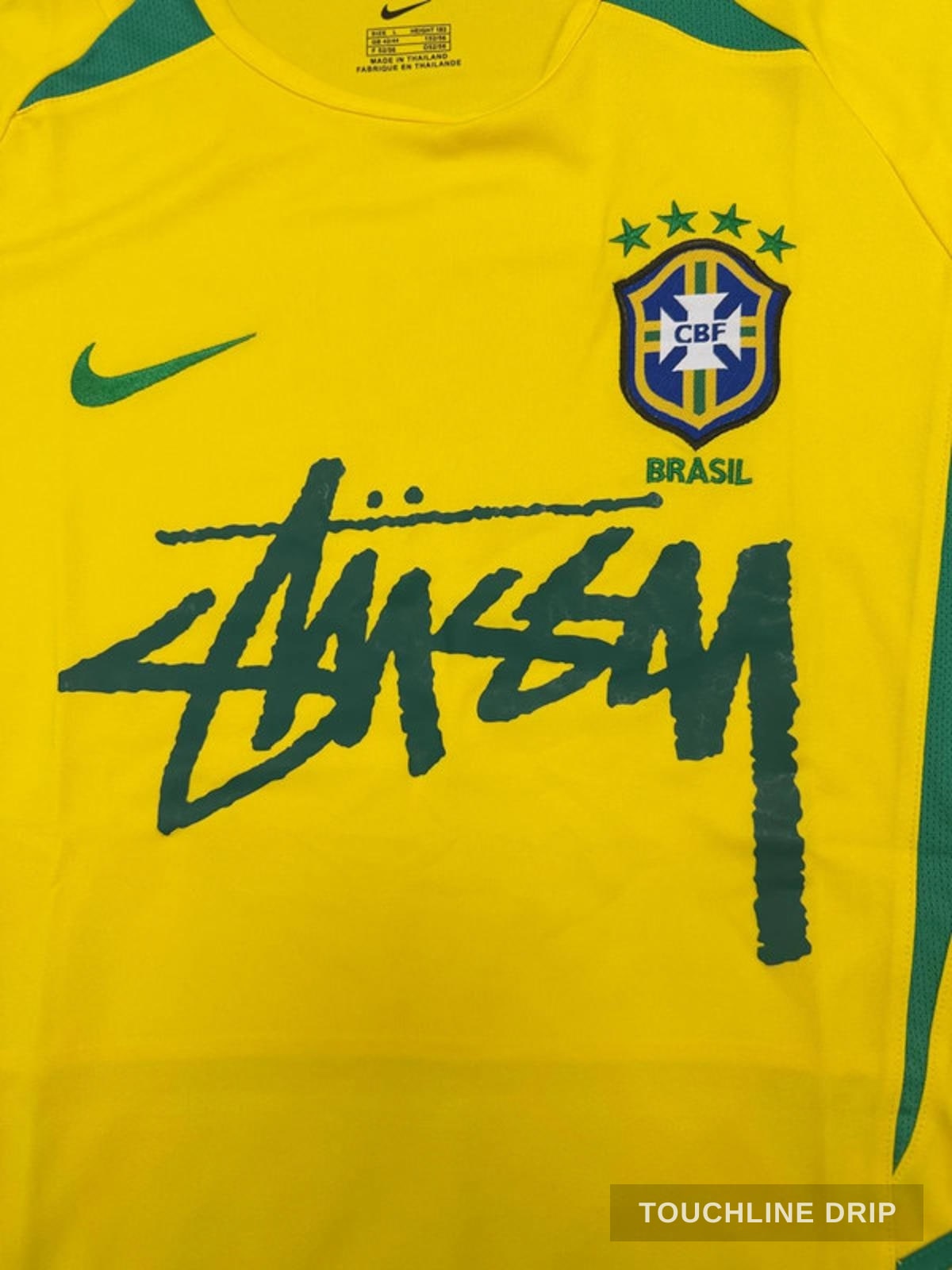 logo closeup product image of Stussy x Brazil Yellow 2002 Inspired Special Edition Jersey