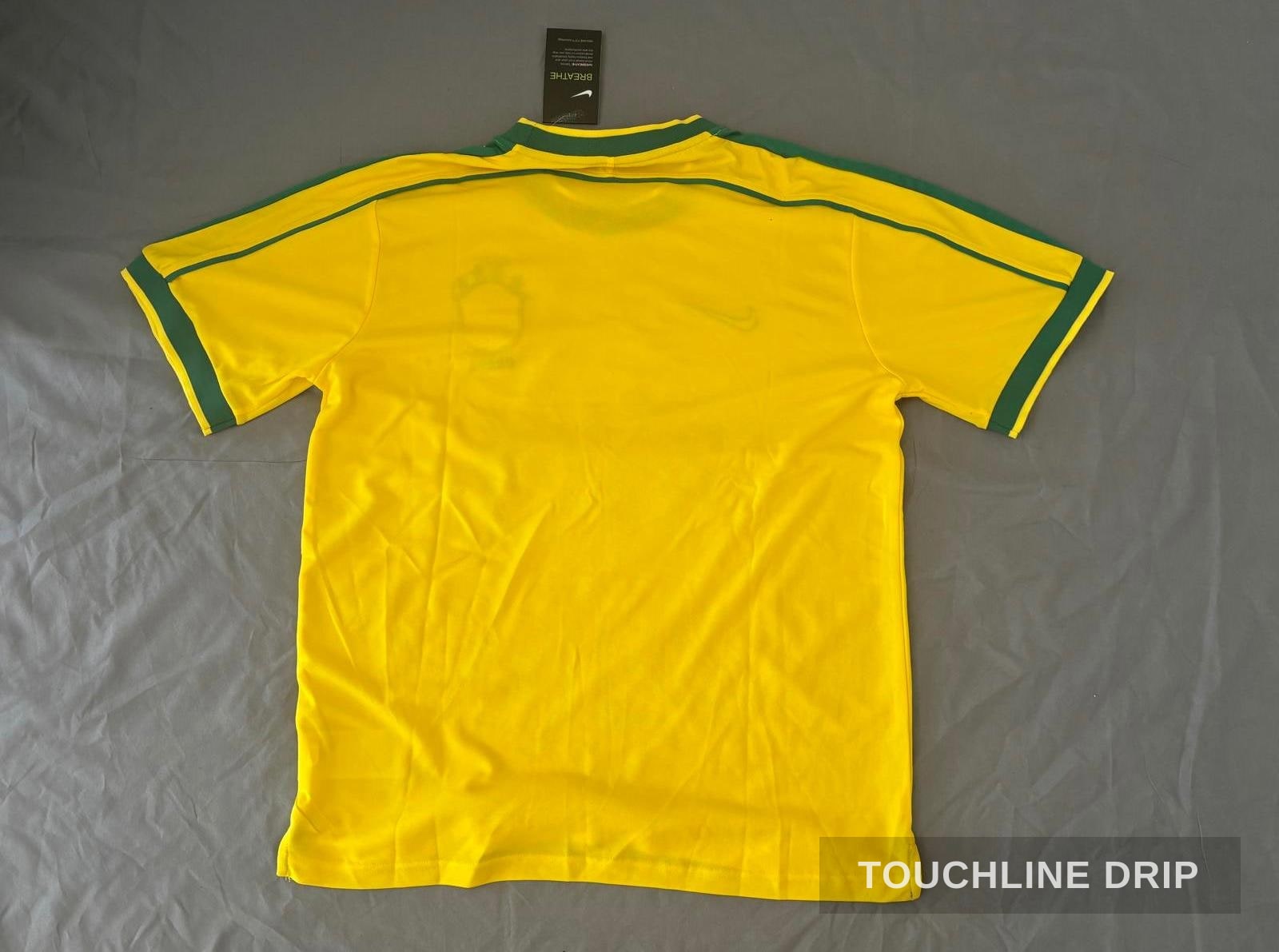 back product image of Nike x Stussy Brazil Yellow 1998 Inspired Special Edition Concept Jersey