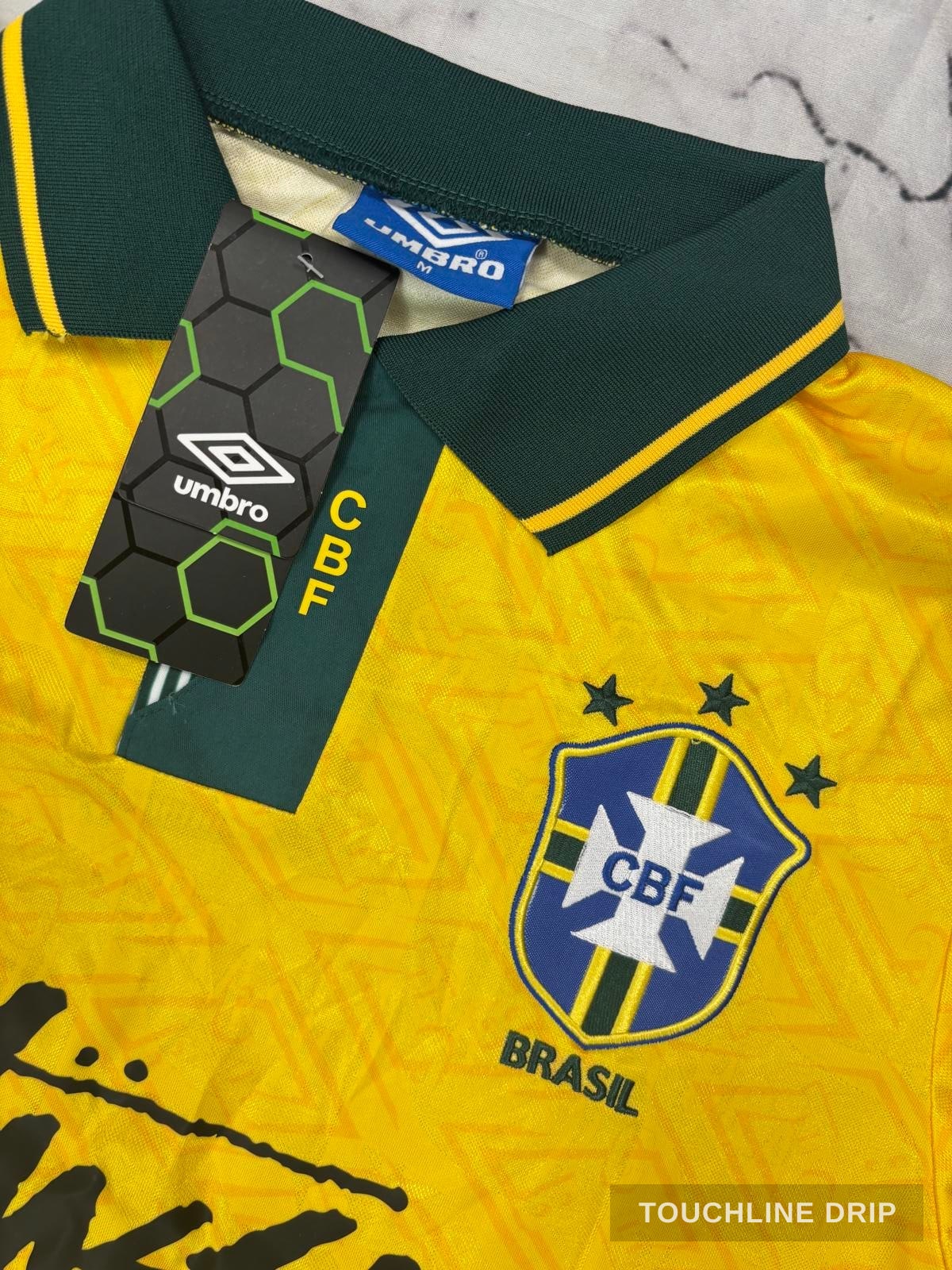 logo closeup product image of Umbro x Stussy 1991 Brazil Home Jersey